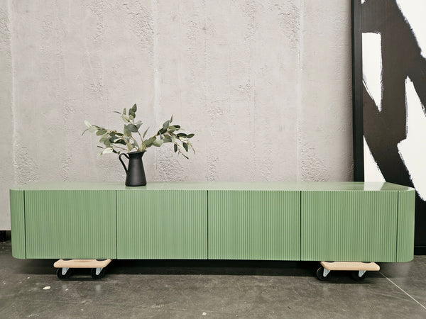 Wall-mounted curved edges fluted TV unit