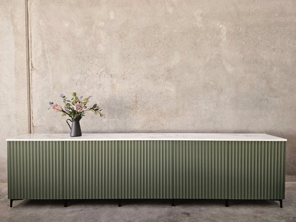 Green Fluted TV unit with stone top