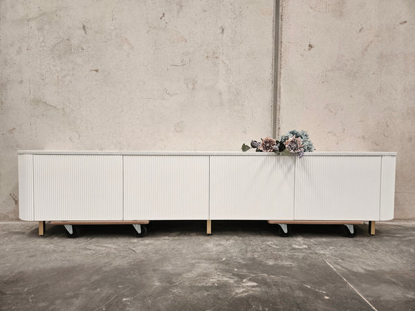 Wall-mounted curved edges TV unit with stone top